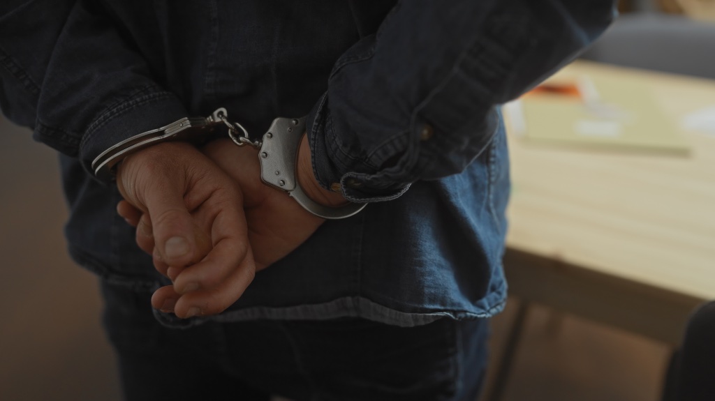 Person in handcuffs